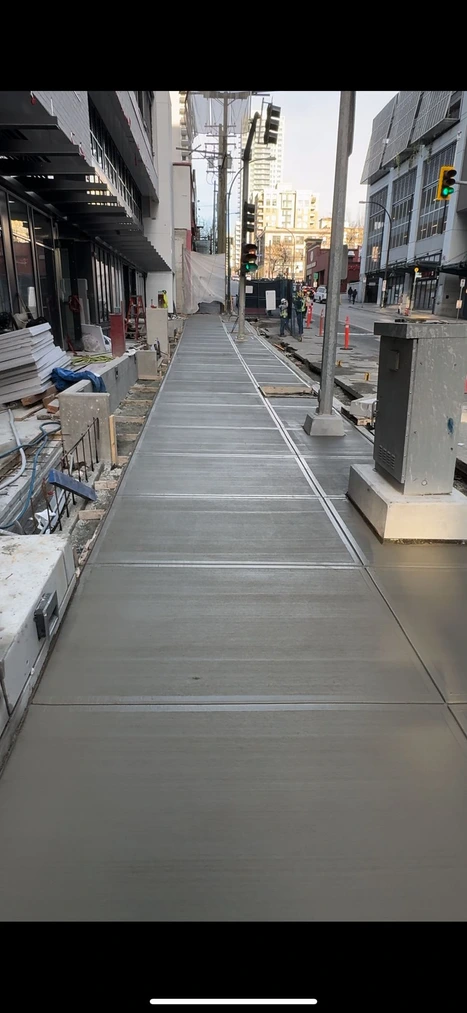 Concrete Formwork and Placing Concrete for Sidewalks